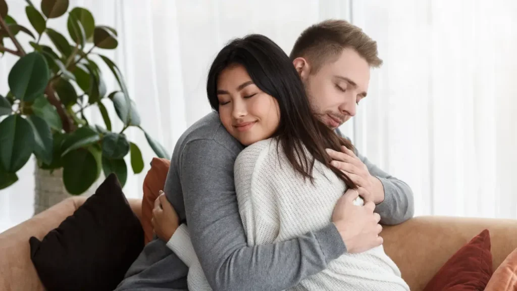 uma imagem simbolizando o perdão, como duas pessoas se reconciliando