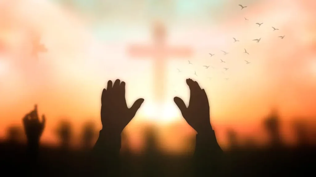 uma imagem como uma pessoa em oração, simbolizando a decisão de entregar a Deus. 